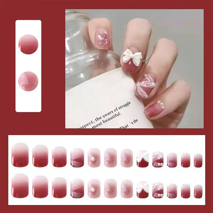 Creative art nails with bows and pearl coating Stornfield