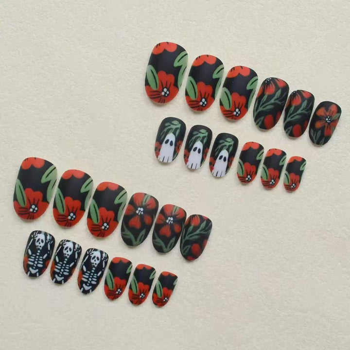 Acrylic nail set with creepy Halloween designs and floral accents Stornfield