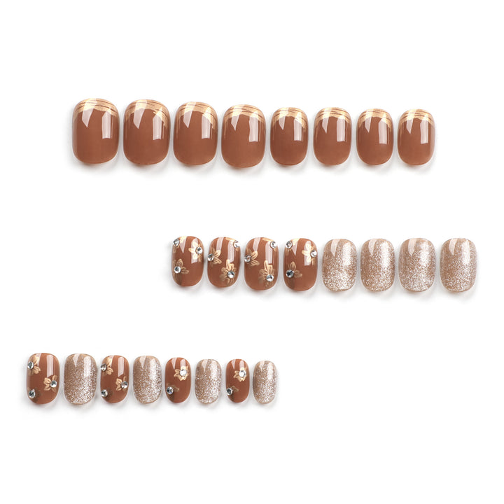 Elegant Nail Decoration with Glitter and Floral Accents Stornfield