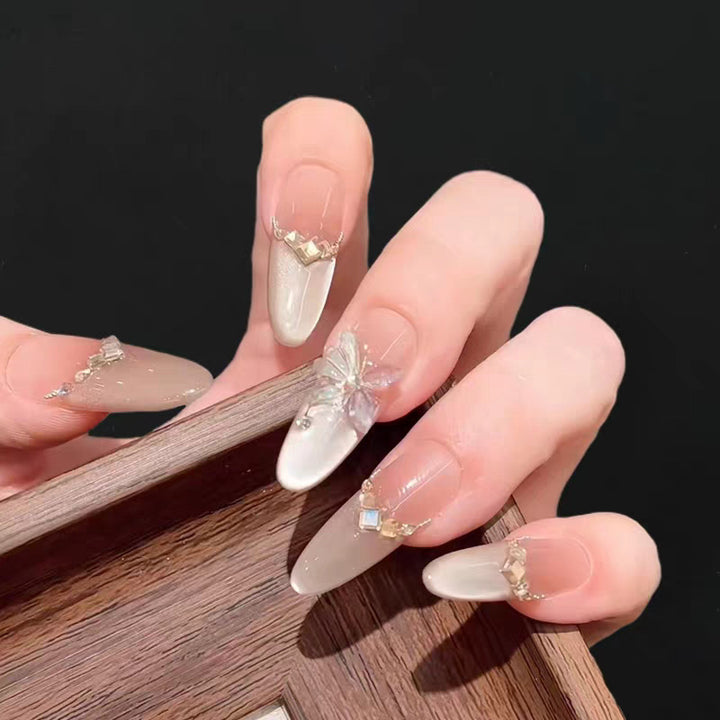 Elegant Stiletto Press-On Nails with Floral Embellishments Stornfield