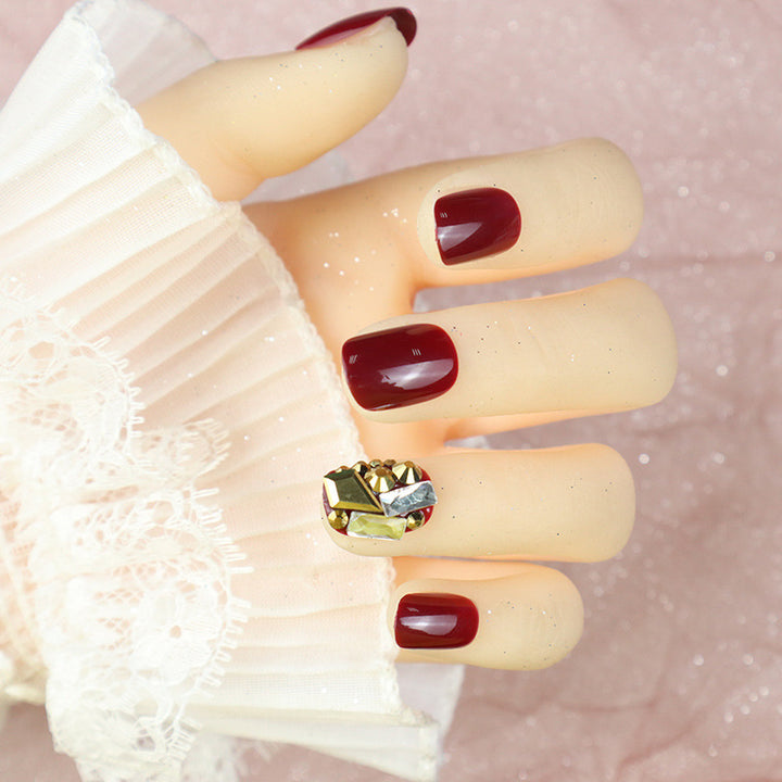 Glossy Press-On Nail Set with Decorative Gem Accents Stornfield