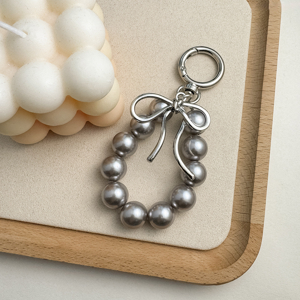 Charming Bow and Bead Keychain Stornfield