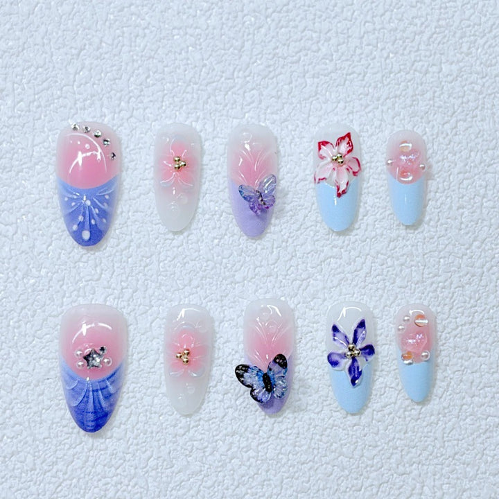Artful Nail Art with Floral Details and Butterflies Stornfield