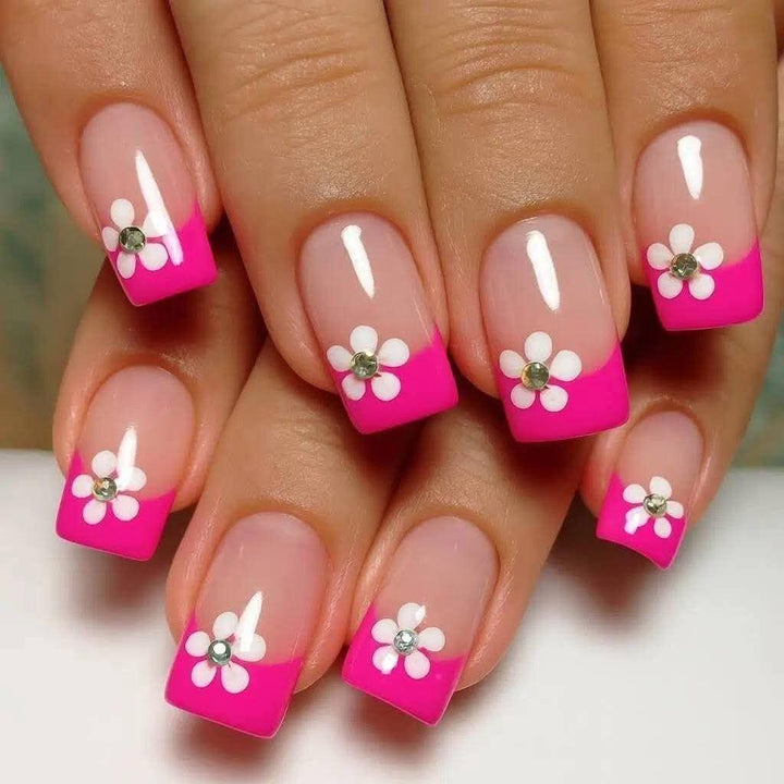 Artificial nails with floral 3D applications Stornfield