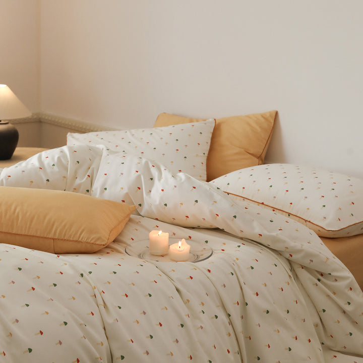 Cotton satin bed linen set with small tree print and contrast piping