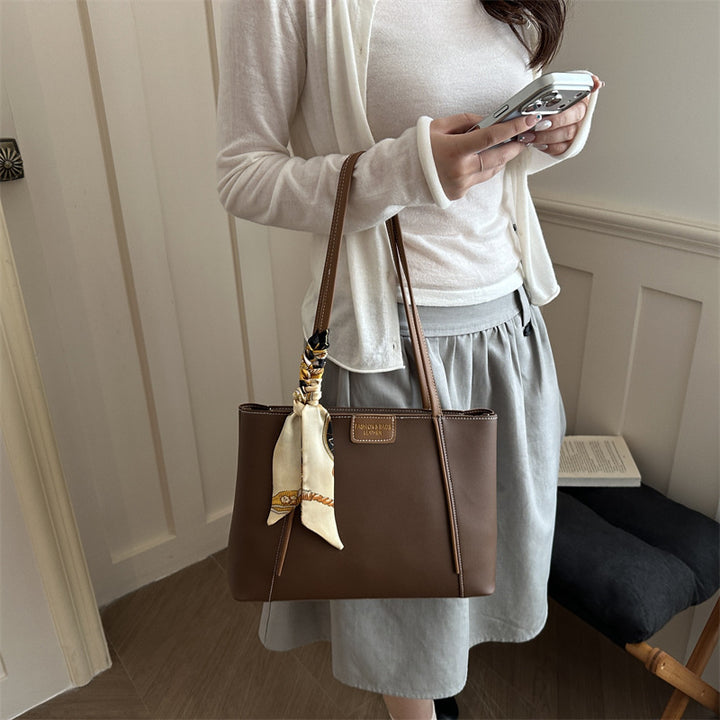Elegant Leather Tote Bag with Decorative Scarf
