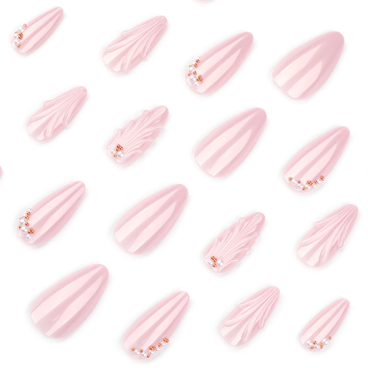 Elegant stiletto nails with shimmer design and pearl decorations Stornfield