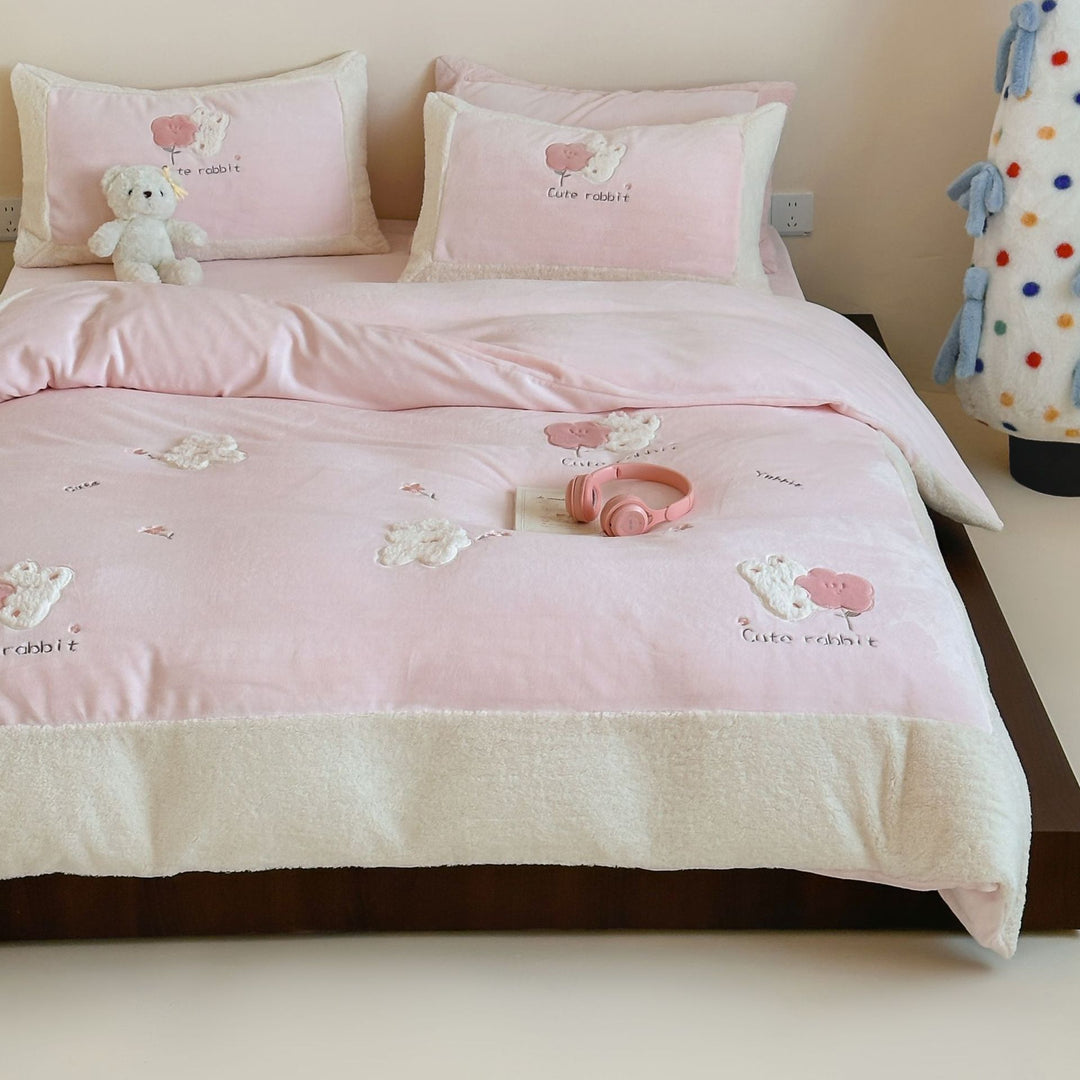 Checked bedding set with embroidered teddy bear appliqués and soft microfiber topper