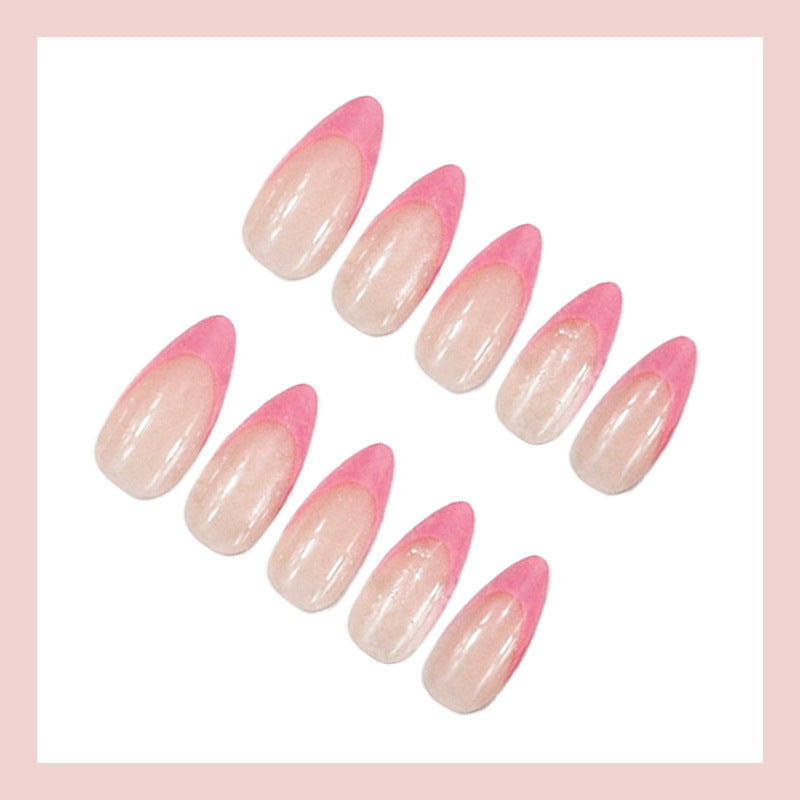 Acrylic nail set with elegant pointed shapes and glossy accents Stornfield
