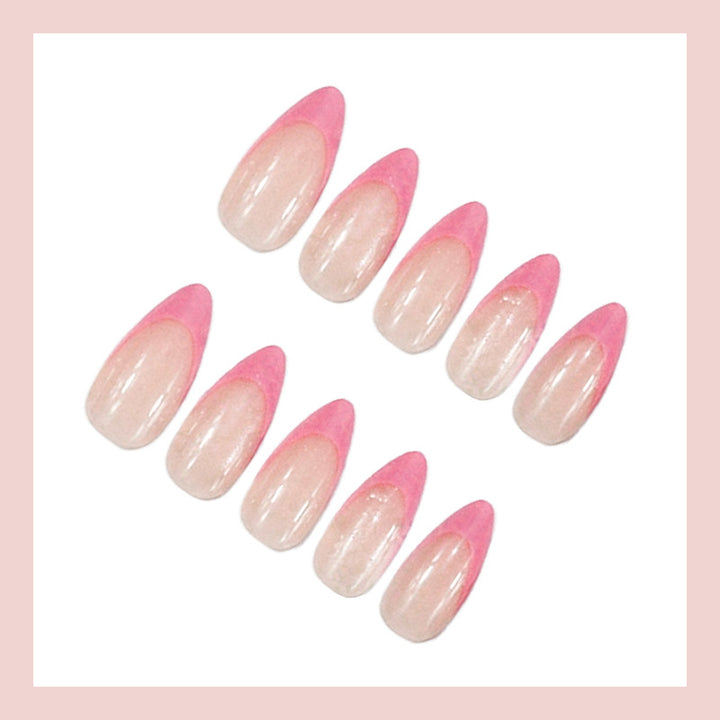 Acrylic nail set with elegant pointed shapes and glossy accents Stornfield