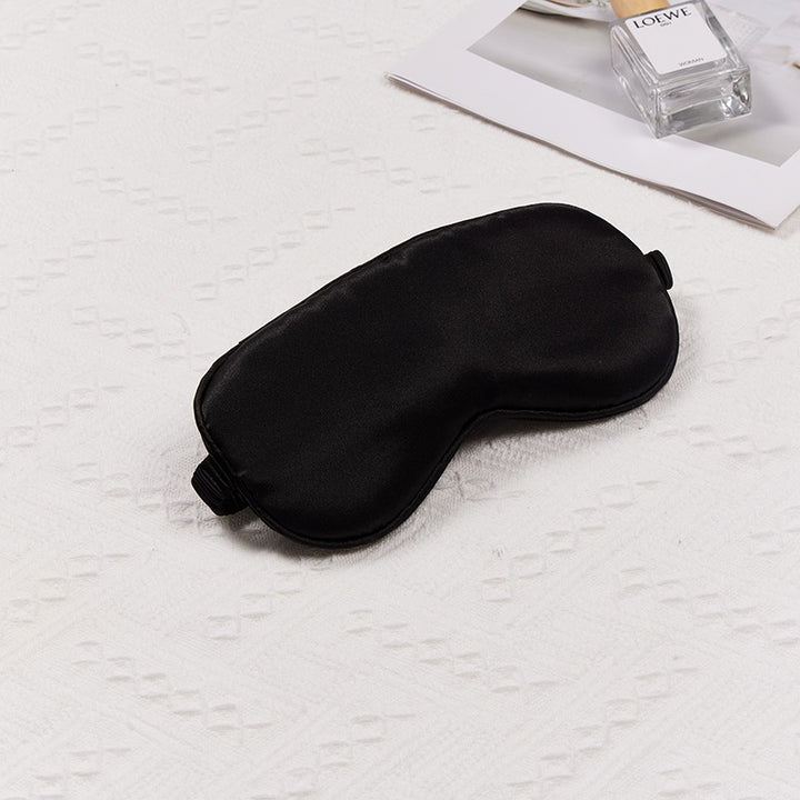 Women's ergonomic sleep mask made of satin-like material with contoured eye area Stornfield