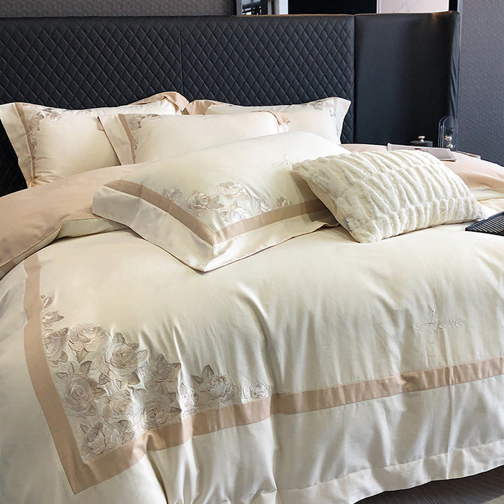 Hotel-style bedding set made of cotton satin with embroidered rose relief and fine border