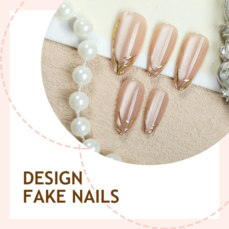 Artificial nail tips with elegant gold accent Stornfield