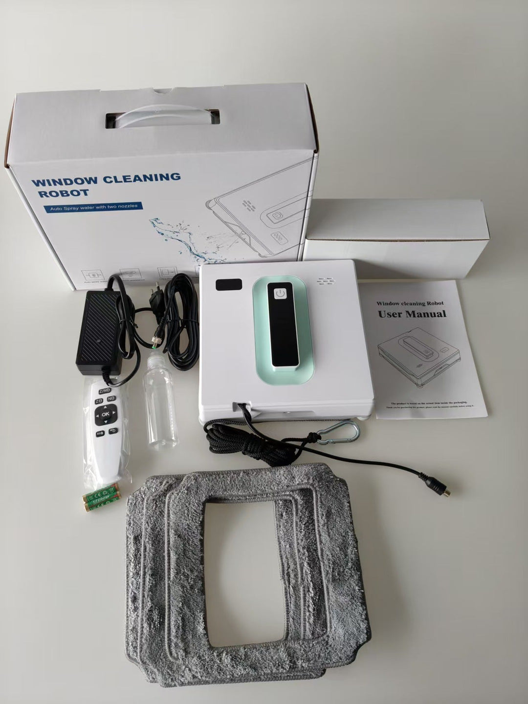 robotic window cleaner with dual-nozzle auto spray and reinforced safety tether Stornfield
