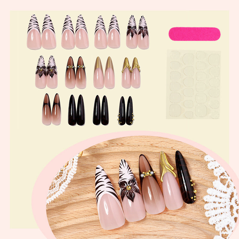 Acrylic nail set with elegant floral design and spectacular glitter accents Stornfield