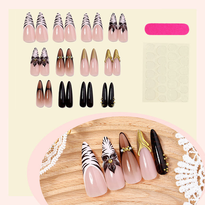 Acrylic nail set with elegant floral design and spectacular glitter accents Stornfield