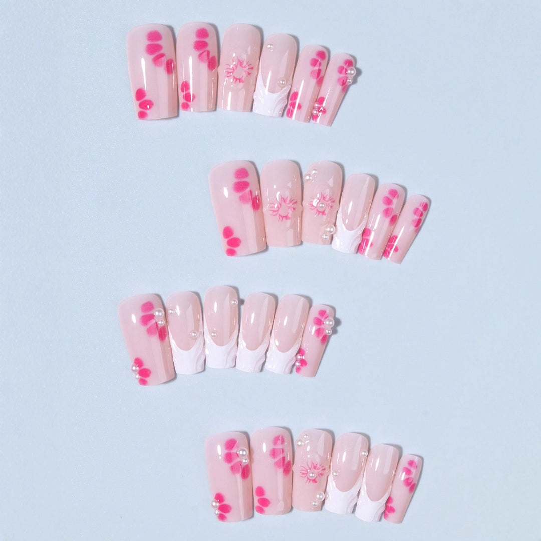 Nail art set with floral 3D decorations and pearl accents Stornfield