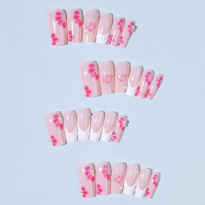 Nail art set with floral 3D decorations and pearl accents Stornfield