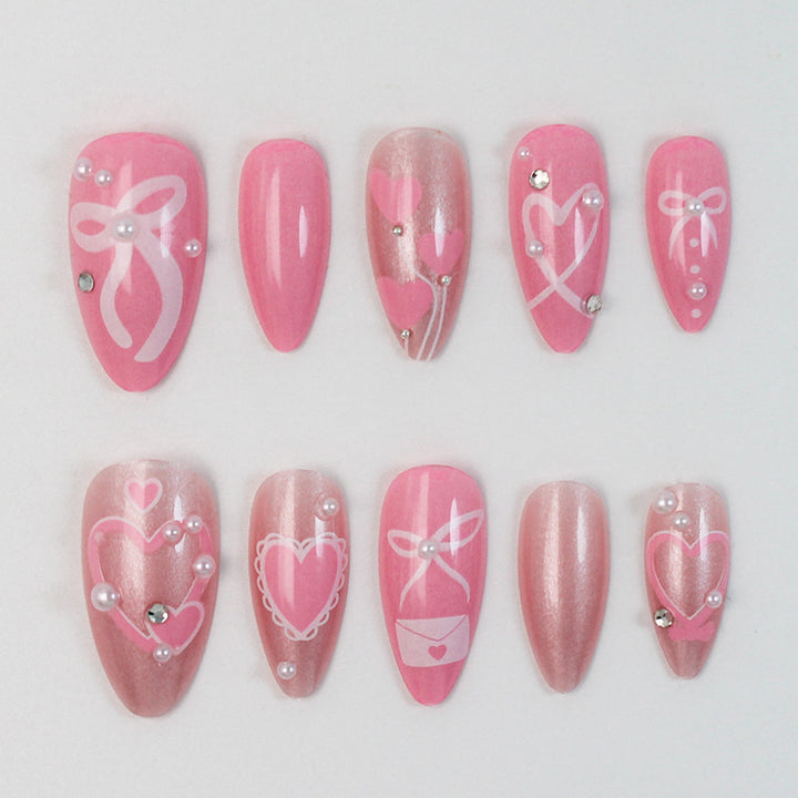 Premium artificial nail set with romantic heart and bow designs Stornfield