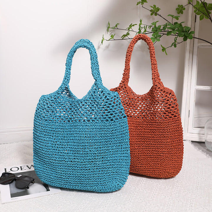Handcrafted straw bag with wide carrying handle Stornfield