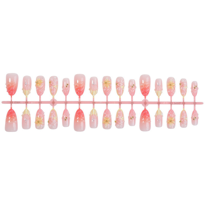 Elegant artificial nail set with floral and glamorous accents Stornfield