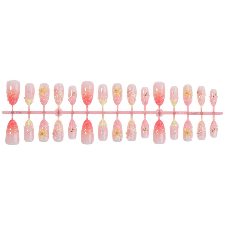 Elegant artificial nail set with floral and glamorous accents Stornfield