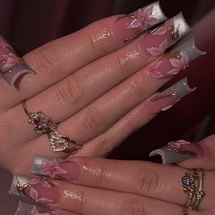 Elegant artificial nail set with floral and glitter elements Stornfield