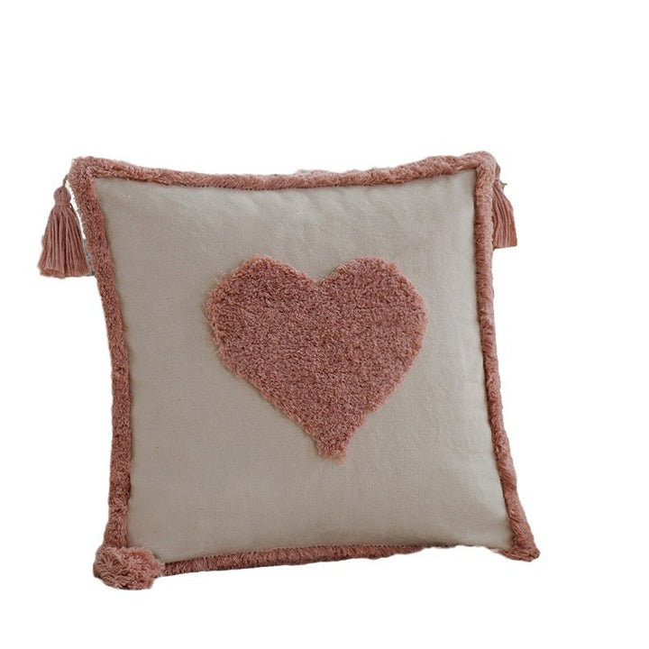 Decorative cushion with heart design