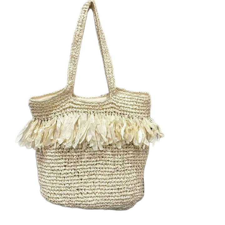 Straw bag with fringes and modern details Stornfield