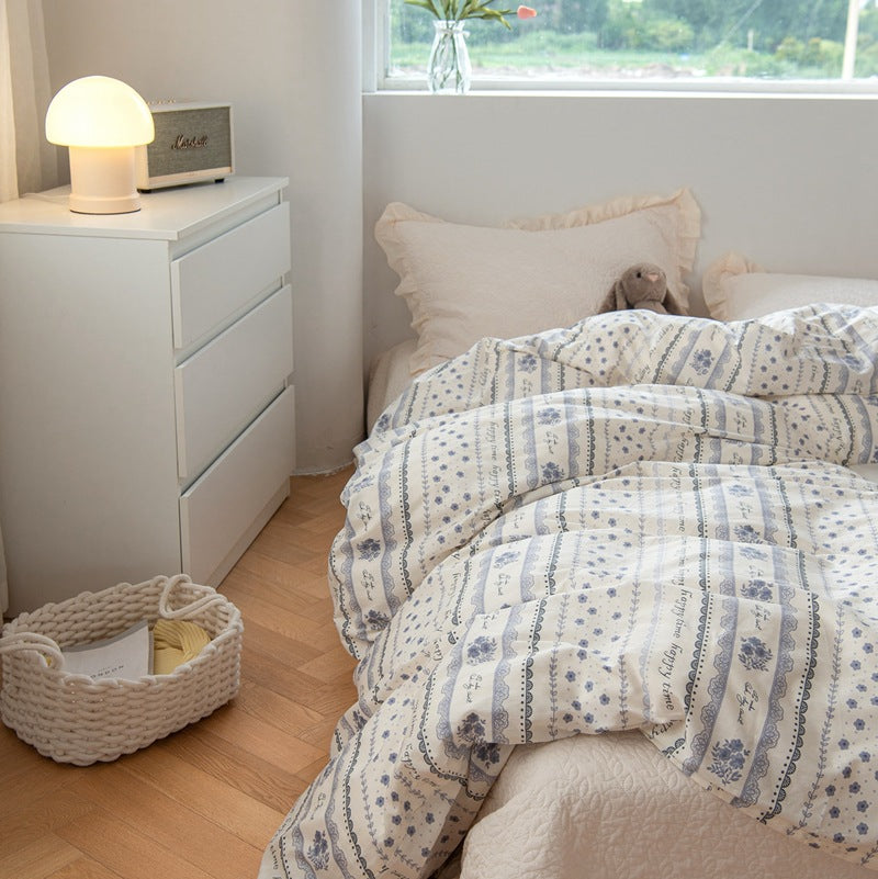 Cotton muslin duvet cover set with delicate mini flower print and ruffled pillow