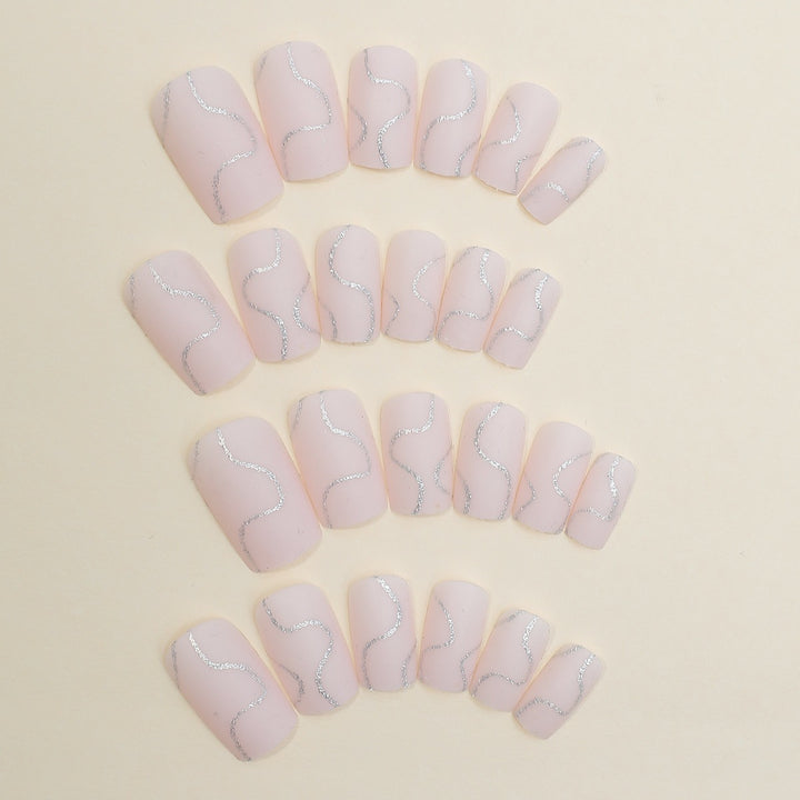 Artificial nail set with elegant lines and glitter accents Stornfield