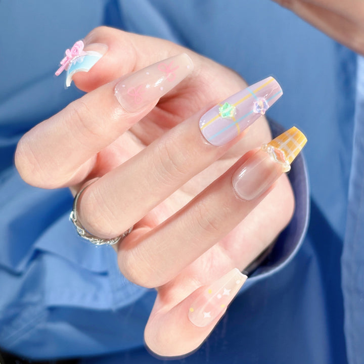 Artistic Press-On Nail Set with Whimsical Designs Stornfield