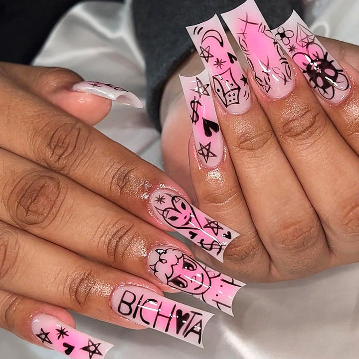 Artificial nail set with playful cartoon motif and shimmering accents Stornfield