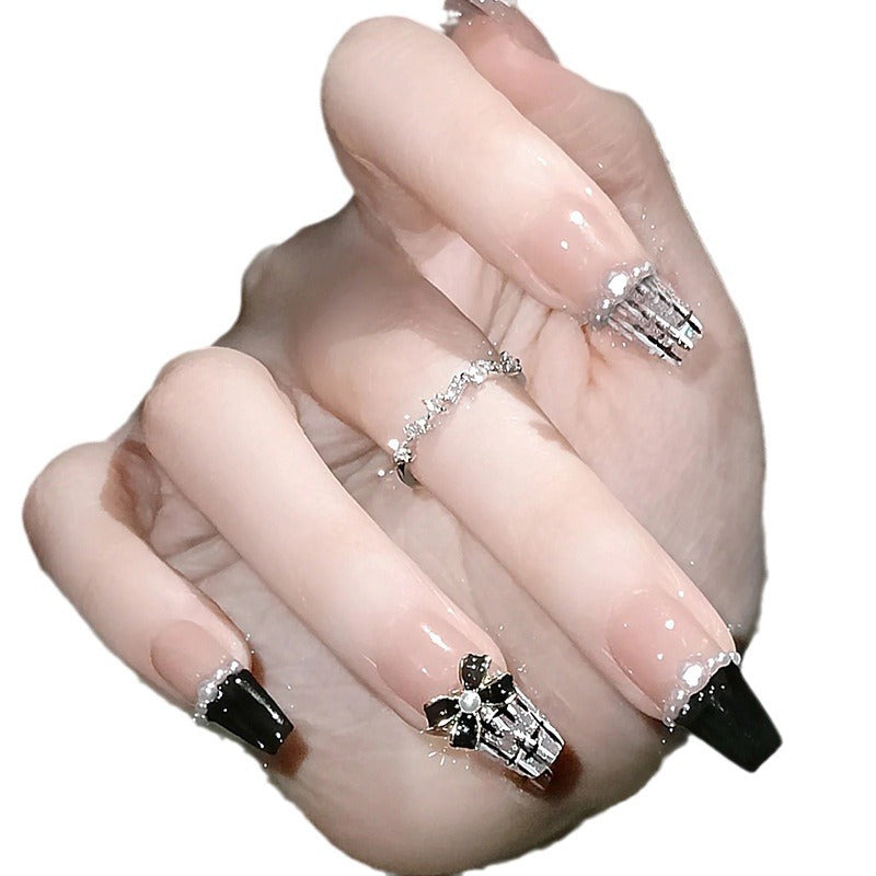 Glamorous artificial fingernails with glitter and moon designs Stornfield