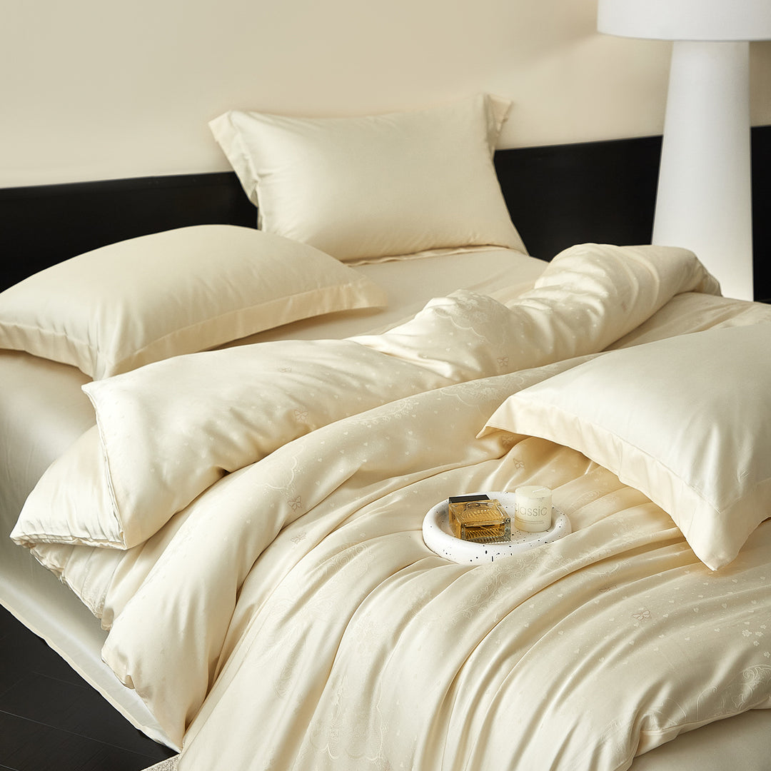 Satin bedding set with silky feel, hotel closure and tone-on-tone pattern