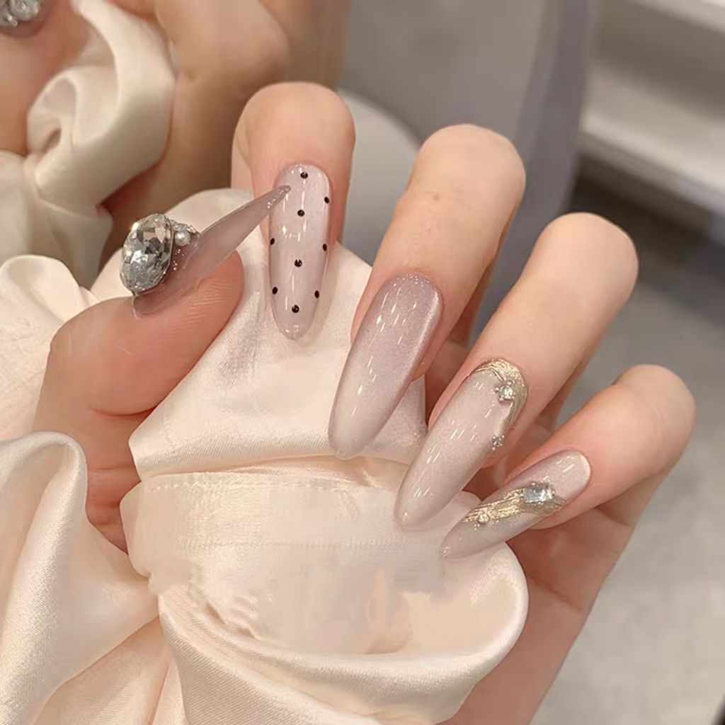 Decorative Stiletto Nail Art Extensions with Rhinestone Accents