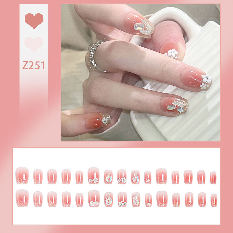 Artificial nail set with floral 3D decorations and elegant glitter Stornfield