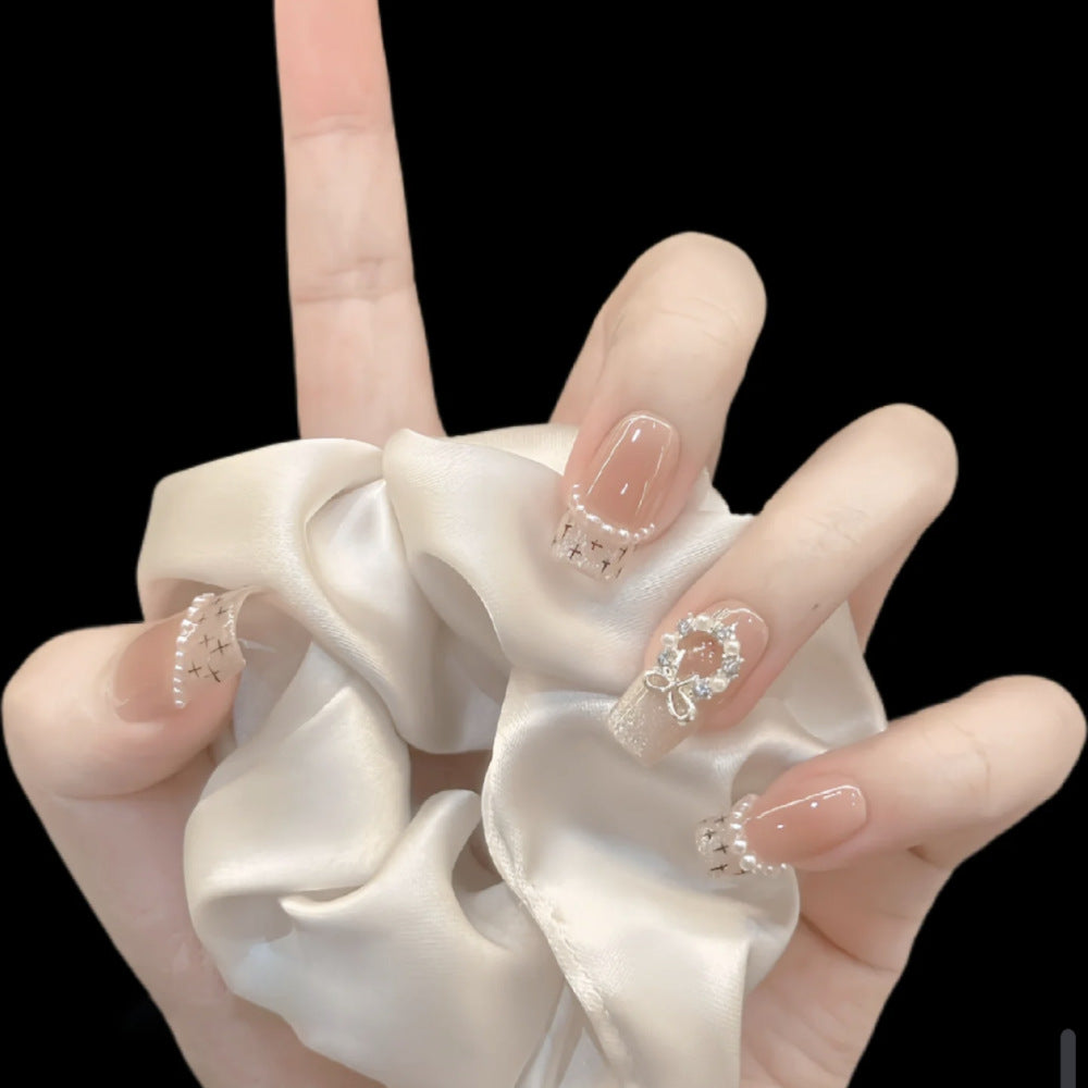 Glamorous artificial nails with sparkling decorations Stornfield
