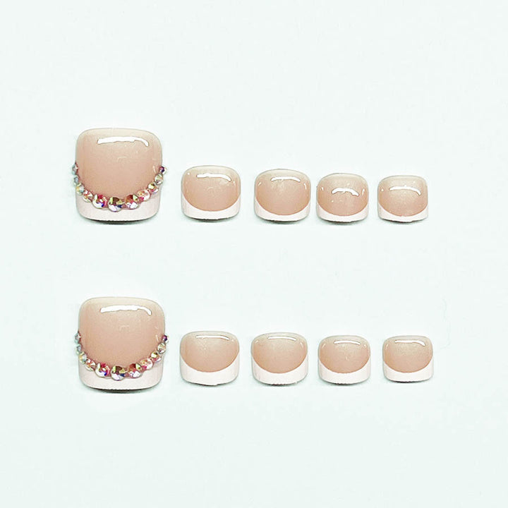 Nail art set with elegant French lace decoration and glitter accents Stornfield