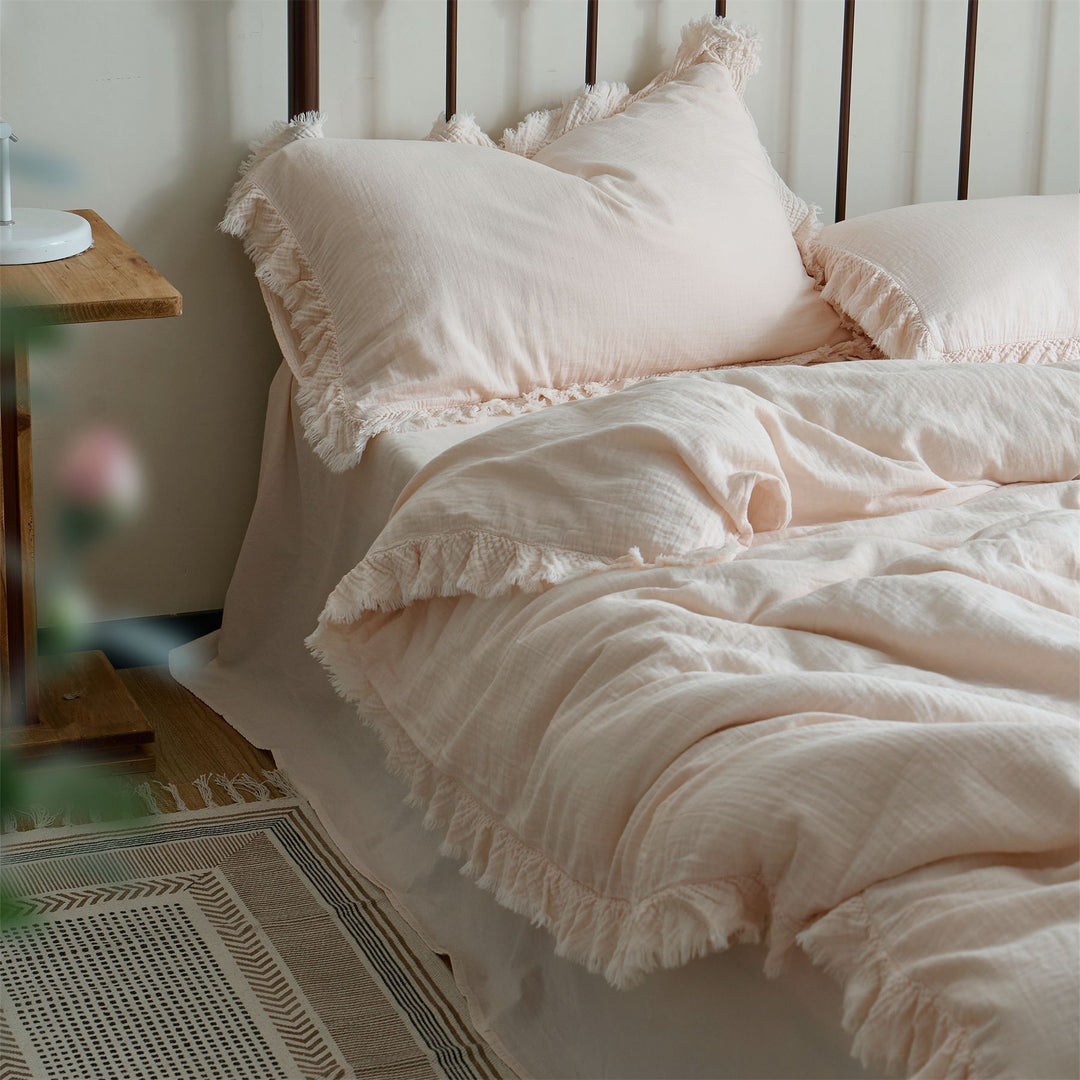 Washed linen bedding set with fringe trim and natural texture