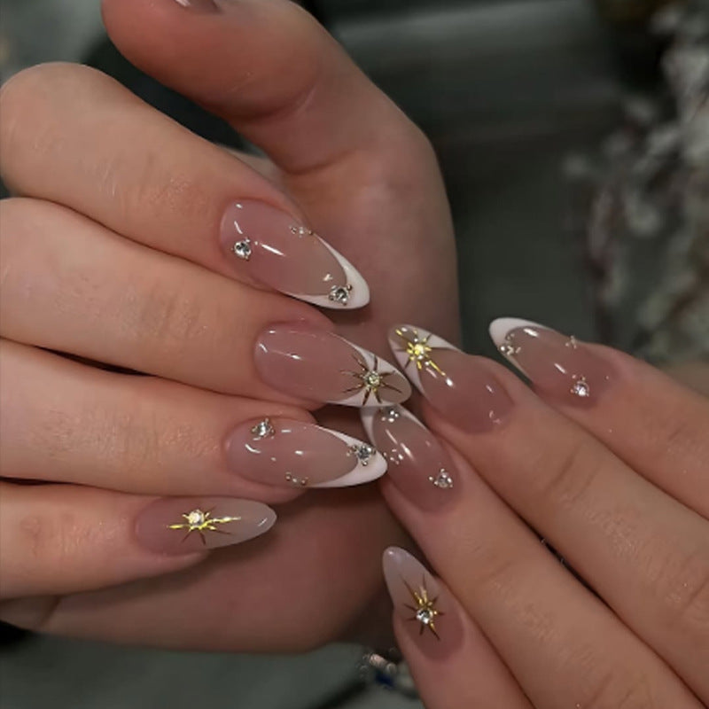 Artificial nail set with elegant tips and glitter accents Stornfield