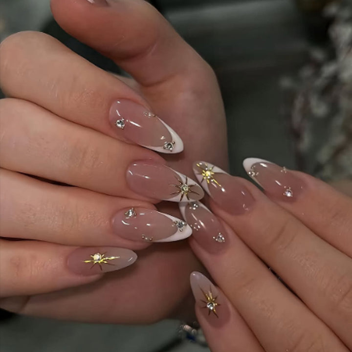Artificial nail set with elegant tips and glitter accents Stornfield