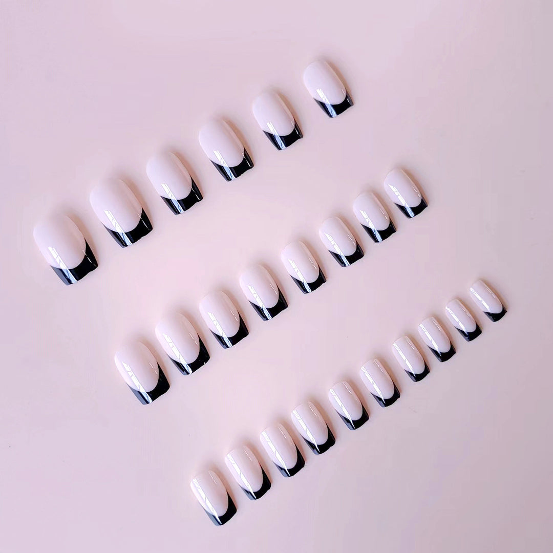 Acrylic nail set with elegant French tips and matte finish Stornfield