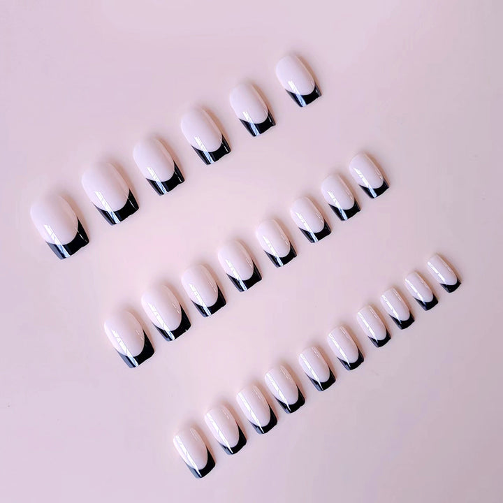 Acrylic nail set with elegant French tips and matte finish Stornfield