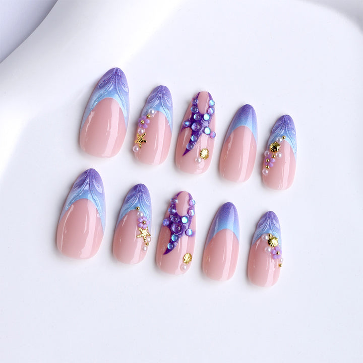 Artificial nails with maritime motifs and glitter accents Stornfield