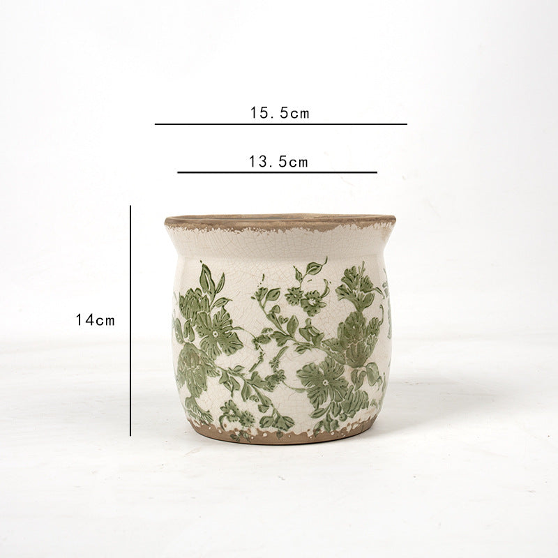 Decorative ceramic plant container with artistic design Stornfield