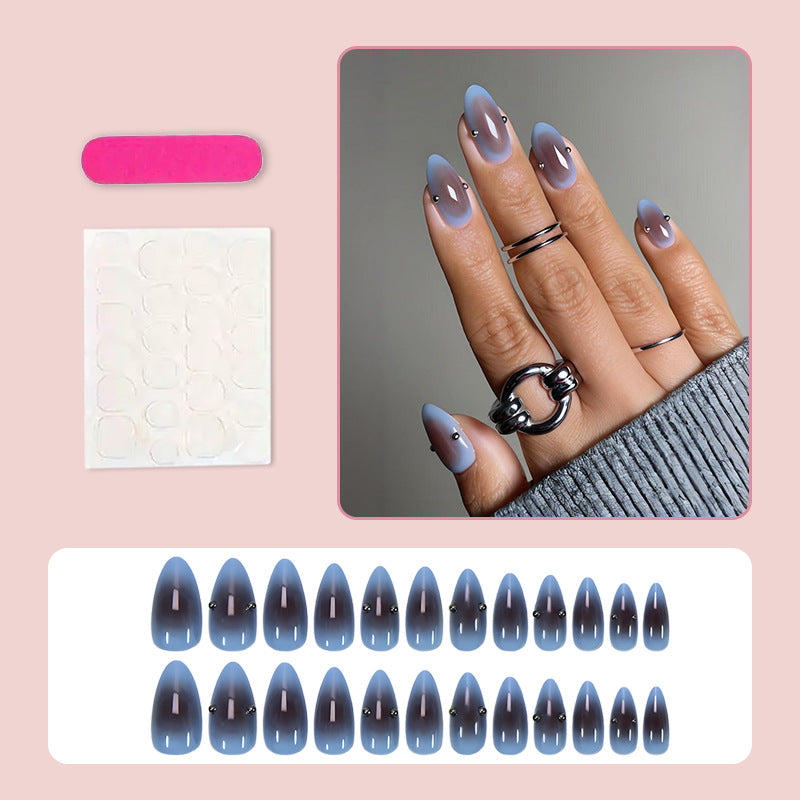 Artificial nail set with elegant gradient and decorative accents Stornfield