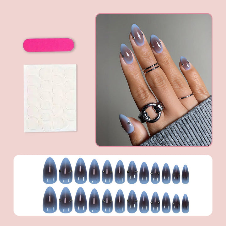 Artificial nail set with elegant gradient and decorative accents Stornfield