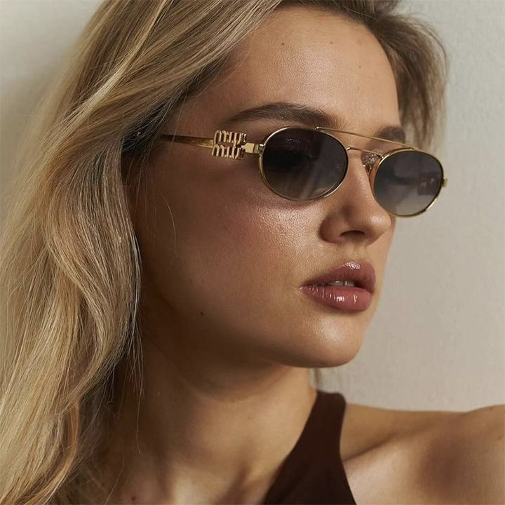 Women's elegant oval sunglasses with luxurious metal frame Stornfield