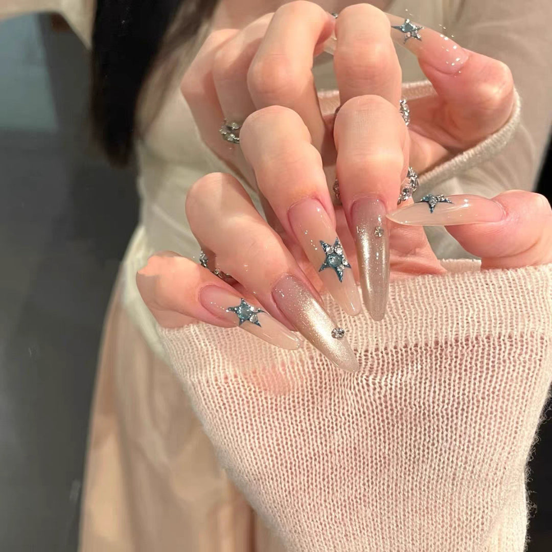Glamorous artificial nails with star accents Stornfield